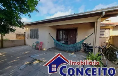C1011 - residência localizada em região de moradores no centro de imbé