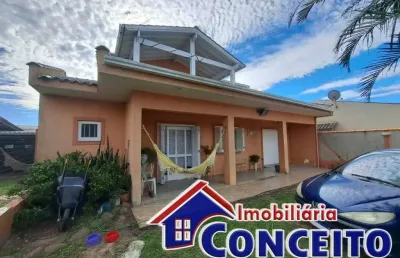 C627 - sobrado com 4 dormitórios em ótima localização no balneário mariluz