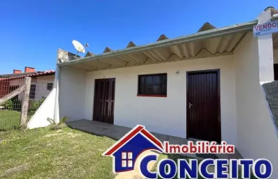 G1001 - lindos geminados em ótima localização no centro de imbé/rs