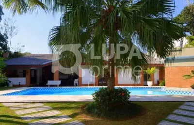Casa no condomínio acapulco de frente para a praia 491 m2 com 4 suítes, 06 vagas de garagem