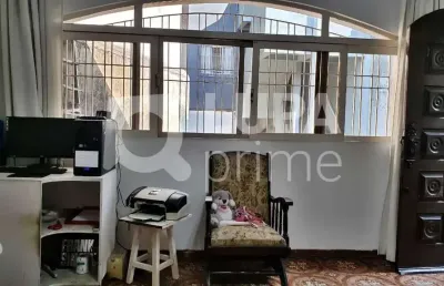 Casa com 2 quartos,  2 vagas de garagem e prédio de 3 andares à venda na vila guilherme