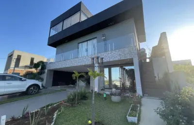 Casa com piscina aquecida e sauna 3 suites em condominio vespasiano