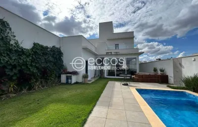 Casa em condomínio à venda, 4 quartos, 4 suítes, 5 vagas, laranjeiras - uberlândia/mg