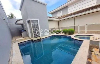 Casa em condomínio à venda, 4 quartos, 4 suítes, 2 vagas, jardim das palmeiras - uberlândia/mg