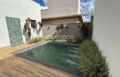 Casa em condomínio à venda, 4 quartos, 4 suítes, 4 vagas, novo mundo - uberlândia/mg