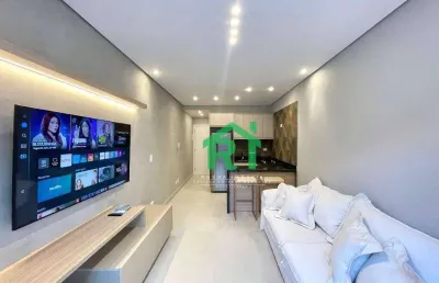 Apartamento à beira mar com 2 dormitórios, 1 vaga, área de lazer, tombo, guarujá/sp