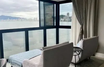 Apartamento vista mar com 1 suíte master e 3 suítes  no centro de itapema