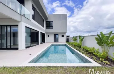 Casa em condomínio fechado com 4 suítes em camboriú