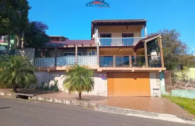 Casa com 4 quartos para alugar na Rua Rio Grande do Norte, 264, Camboim, Sapucaia do Sul