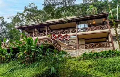 Casa de luxo em condomínio à venda em iporanga - guarujá-sp: 7 quartos, 7 suítes, 3 salas, 8 banheiros, 4 vagas, 338m².