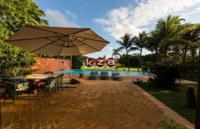 Imperdível residência de alto padrão à venda em guarujá-sp, golf alcapulco - praia do pernambuco, com 4 suítes e 576,00 m² de área.