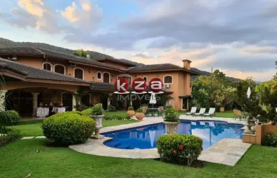 Luxuosa mansão em condomínio à venda em guarujá-sp, jardim acapulco: 5 quartos, 5 suítes, 3 salas, 7 banheiros, 6 vagas, 676m².