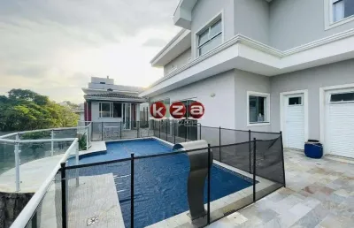 Casa de luxo no condomínio terras de santa teresa em vinhedo, com 4 suítes, 3 salas e 350m² de área privativa. venha conferir!
