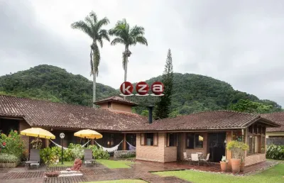 Casa de luxo a venda em ubatuba, praia dura, frente para o mar. 6 suítes, 3 salas, 8 banheiros, 11 vagas, área gourmet592 m².
