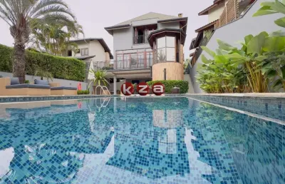 Casa de luxo a venda no condomínio reserva colonial em valinhos: 3 suítes + 1, 4 salas e amplo espaço gourmet com piscina.