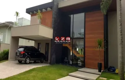 Luxuosa casa de alto padrão no condomínio portal do lago em valinhos-sp: 3 suítes, 3 salas, 5 banheiros, 4 vagas de garagem, 454m².