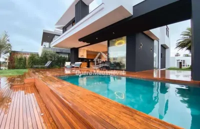 Casa em condomínio fechado com 5 quartos à venda na rua rio novo, 1672, centro, xangri-lá por r$ 4.600.000