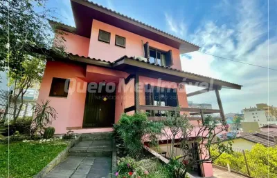 Casa com 3 quartos à venda na rua túlio das sois, 157, bela vista, caxias do sul por r$ 1.060.000