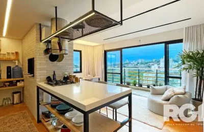 Apartamento de 72 m2 para alugar com 1 suíte, banheiro social com depósito e 2 vagas, finamente mobiliado e decorado.
