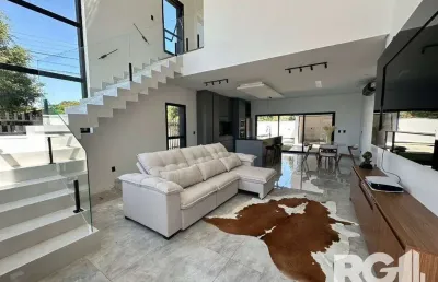 Casa de alto padrão a venda, totalmente mobiliada, com 2 dormitórios, 1 suite e 2 vagas no centro de nova santa rita.