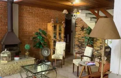 Casa com 4 quartos à venda na Rua Investigador Pedro Loeci Martins, 87, Nonoai, Porto Alegre