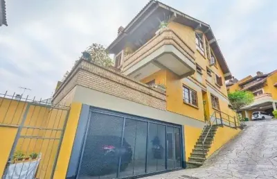 Casa com 3 quartos à venda na Rua Edgar Luiz Schneider, 120, Jardim Isabel, Porto Alegre