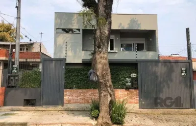 Casa com 4 quartos à venda na Rua Menezes Paredes, 341, Nonoai, Porto Alegre