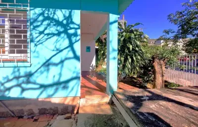Casa com 4 quartos à venda na Rua Sebastião Wolf, 372, Nonoai, Porto Alegre