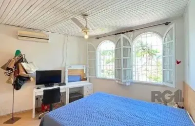 Casa com 3 quartos à venda na Rua Conselheiro Xavier da Costa, 2102, Ipanema, Porto Alegre