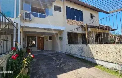 Casa com 2 quartos à venda na Rua Santos Zottis, 238, Hípica, Porto Alegre