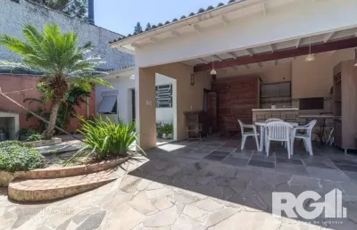 Casa com 3 quartos à venda na Rua Gaston Englert, 547, Vila Ipiranga, Porto Alegre