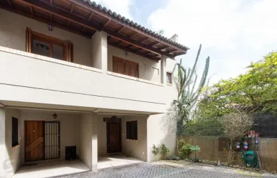 Casa em condomínio fechado com 2 quartos à venda na Avenida Guarujá, 176, Guarujá, Porto Alegre