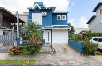 Casa em condomínio fechado com 3 quartos à venda na Rua Pau-Brasil, 529, Hípica, Porto Alegre