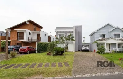 Casa em condomínio fechado com 3 quartos à venda na Avenida Juca Batista, 9055, Belém Novo, Porto Alegre