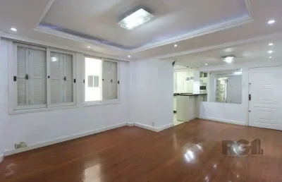 Apartamento semi-mobiliado, possui 3 dormitórios, sendo 1 suíte