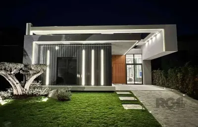 Casa térrea no condomínio velas da marina com 4 suítes, piscina e 243m² privativos