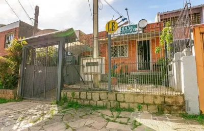 Casa com 3 quartos à venda na Avenida José Gertum, 582, Chácara das Pedras, Porto Alegre