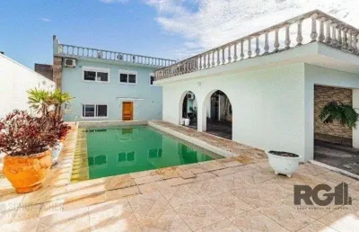 Casa com 4 quartos à venda na Rua Miracema, 229, Chácara das Pedras, Porto Alegre