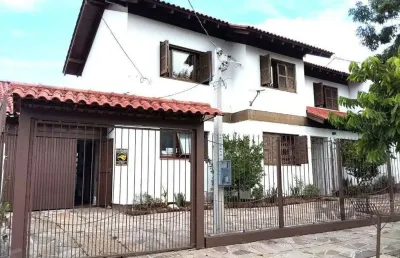 Casa com 3 quartos à venda na Rua Ari Peixoto Martins, 142, Espírito Santo, Porto Alegre