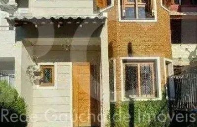 Casa com 3 quartos à venda na Rua Jayme Saul de Borba, 108, Espírito Santo, Porto Alegre