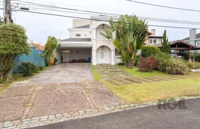 Casa em condomínio fechado com 3 quartos à venda na Avenida Juca Batista, 9067, Belém Novo, Porto Alegre