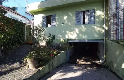 Casa com 3 quartos à venda na Rua Álvaro Nicofé, 162, Vila Jardim, Porto Alegre
