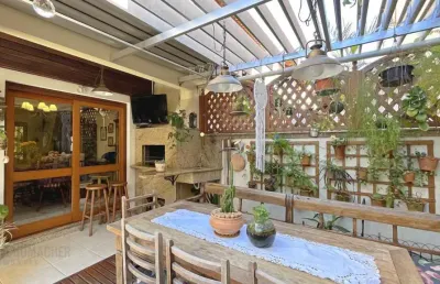 Casa em condomínio fechado com 3 quartos à venda na Avenida Eduardo Prado, 2042, Cavalhada, Porto Alegre