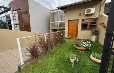 Sobrado com 133 m2, 3 dormitórios e 2 vagas, semimobiliado a venda em nova santa rita.