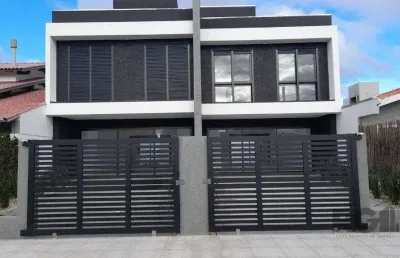 Sobrado centro xangri - lá nunca habitado 3 suites 2 vagas