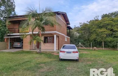 Casa com 2 quartos à venda na Beco da Vitória, 364, Boa Vista do Sul, Porto Alegre