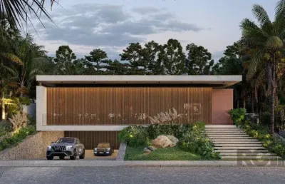 A casa conta com 434m2 de área construída, mas com um aproveitamento total dos 1.012m2 do lote