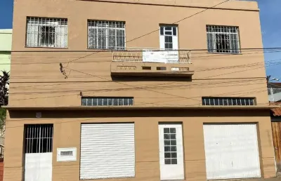 Casa com local comercial e apartamento - centro- santana do livramento-rs