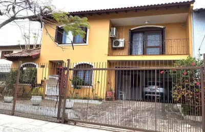 Casa com 5 quartos à venda na Rua André Primo Biazetto, 469, Campo Novo, Porto Alegre