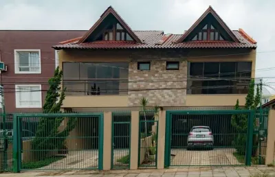 Casa com 3 quartos à venda na Rua Dom Jaime de Barros Câmara, 771, Sarandi, Porto Alegre
